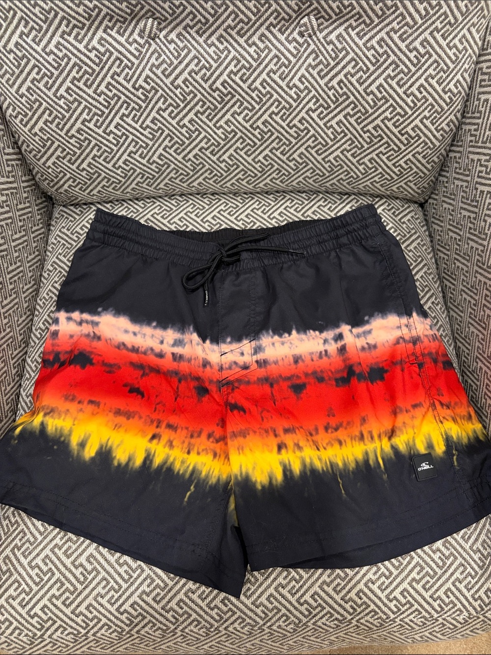 O'Neill Men’s Black Swim Trunks with Red, Orange & Yellow Tie-Dye Stripe